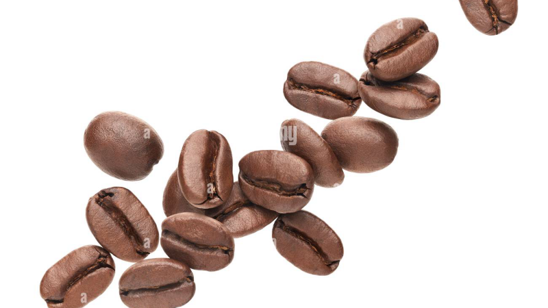 person pouring coffee and checking glucose meter