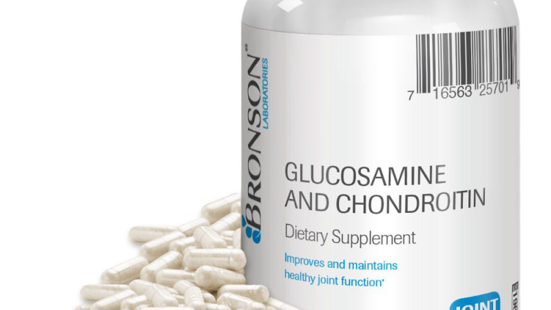 Arthro MD+ supplement capsules and glass of water