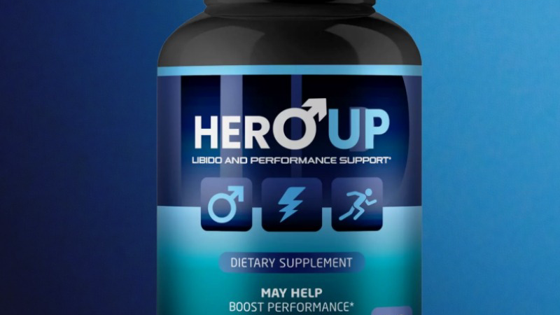 bottle of supplement with label Hero UP and capsules