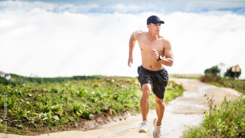 athlete running in nature, healthy lifestyle
